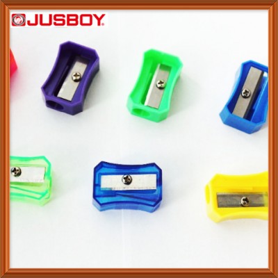 Plastic school student pencil sharpener with many colors